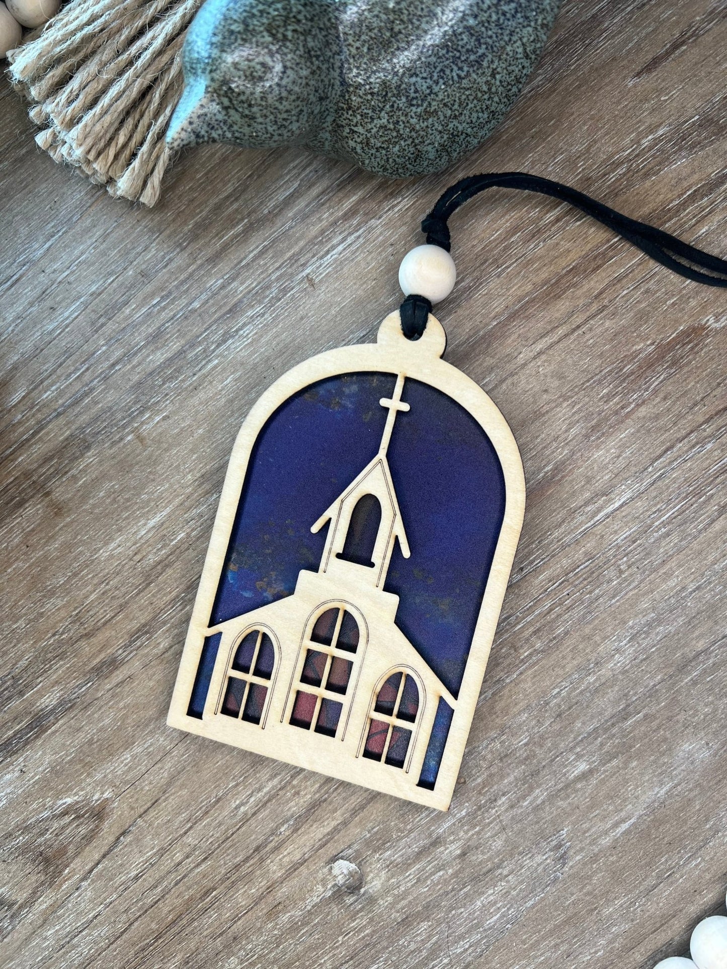 Colorful church suncatcher with stained glass effect, crafted from wood and acrylic.