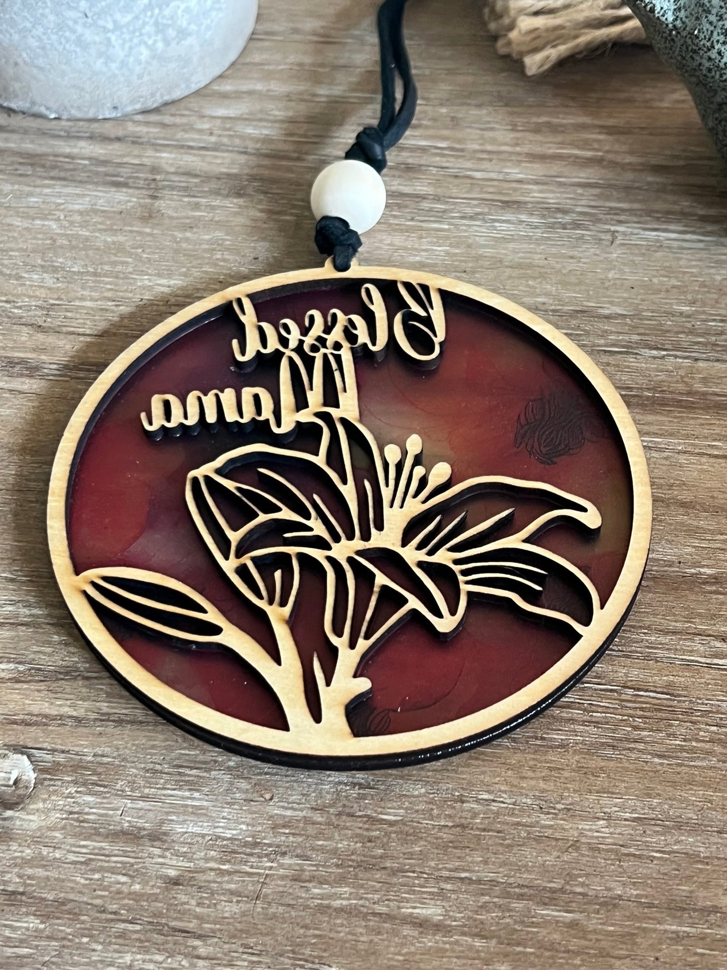 Handmade pink and coral Blessed Mama suncatcher with natural wood frame.