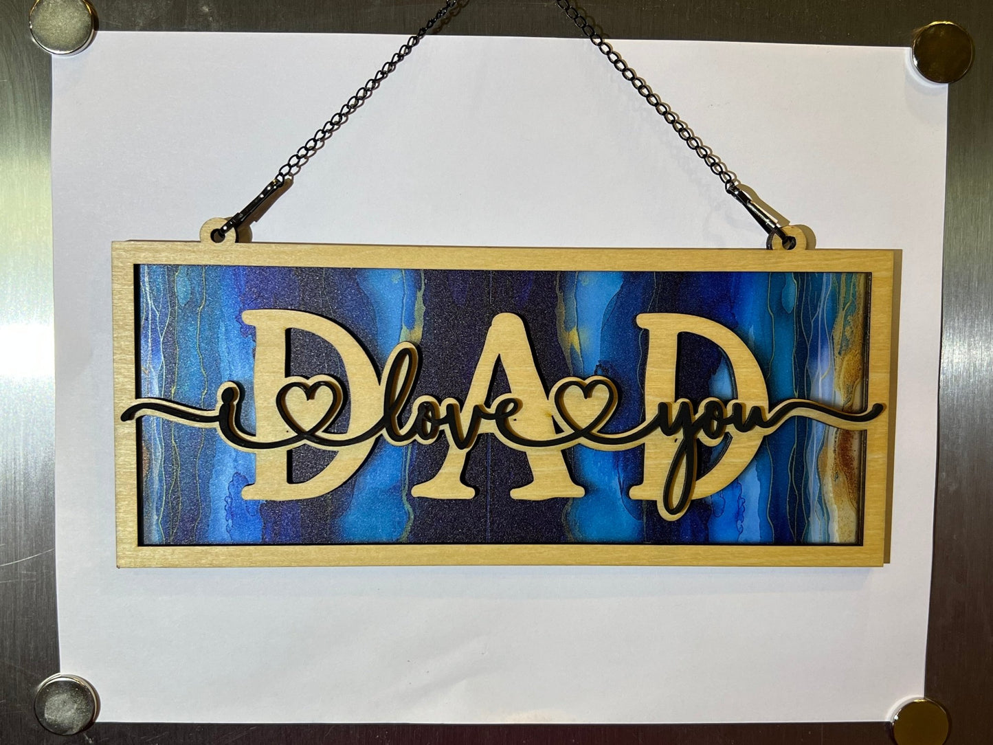 Handmade 'Dad I Love You' wood and acrylic suncatcher with stained glass effect.