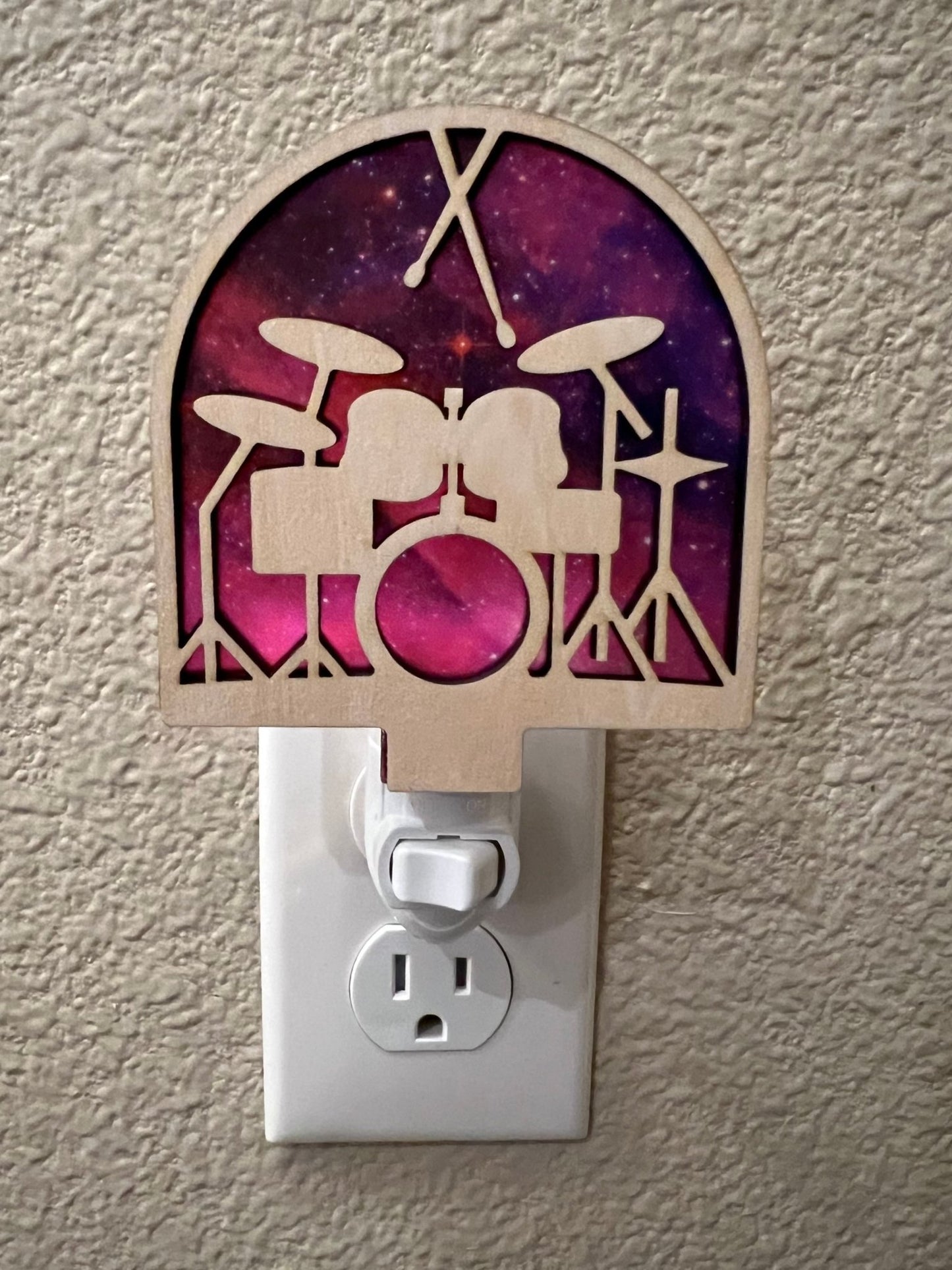 Rustic wood and acrylic nightlight with stained glass effect in multicolor.