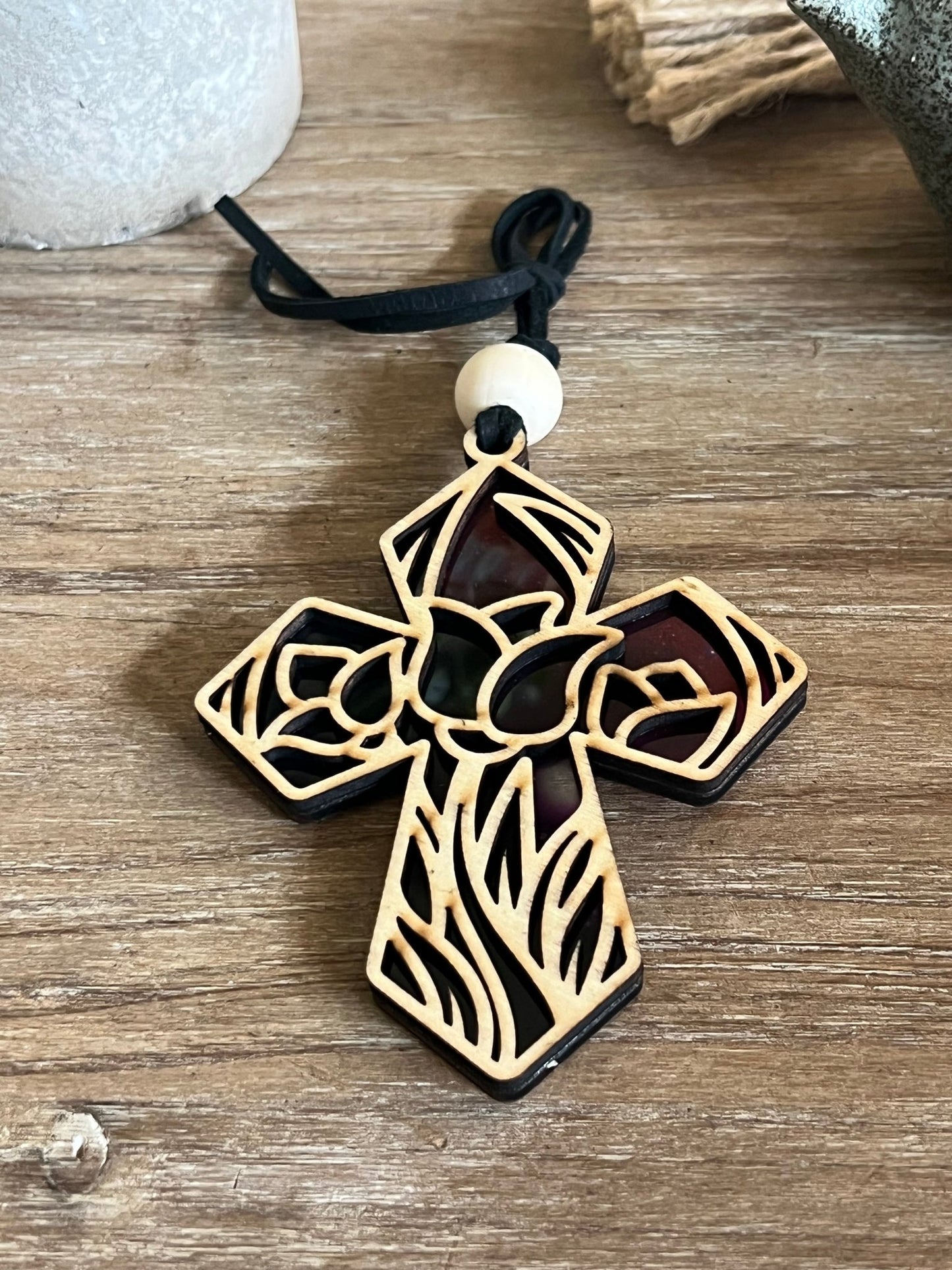 Tulip Cross Suncatcher with wood and acrylic, capturing light with rustic charm.