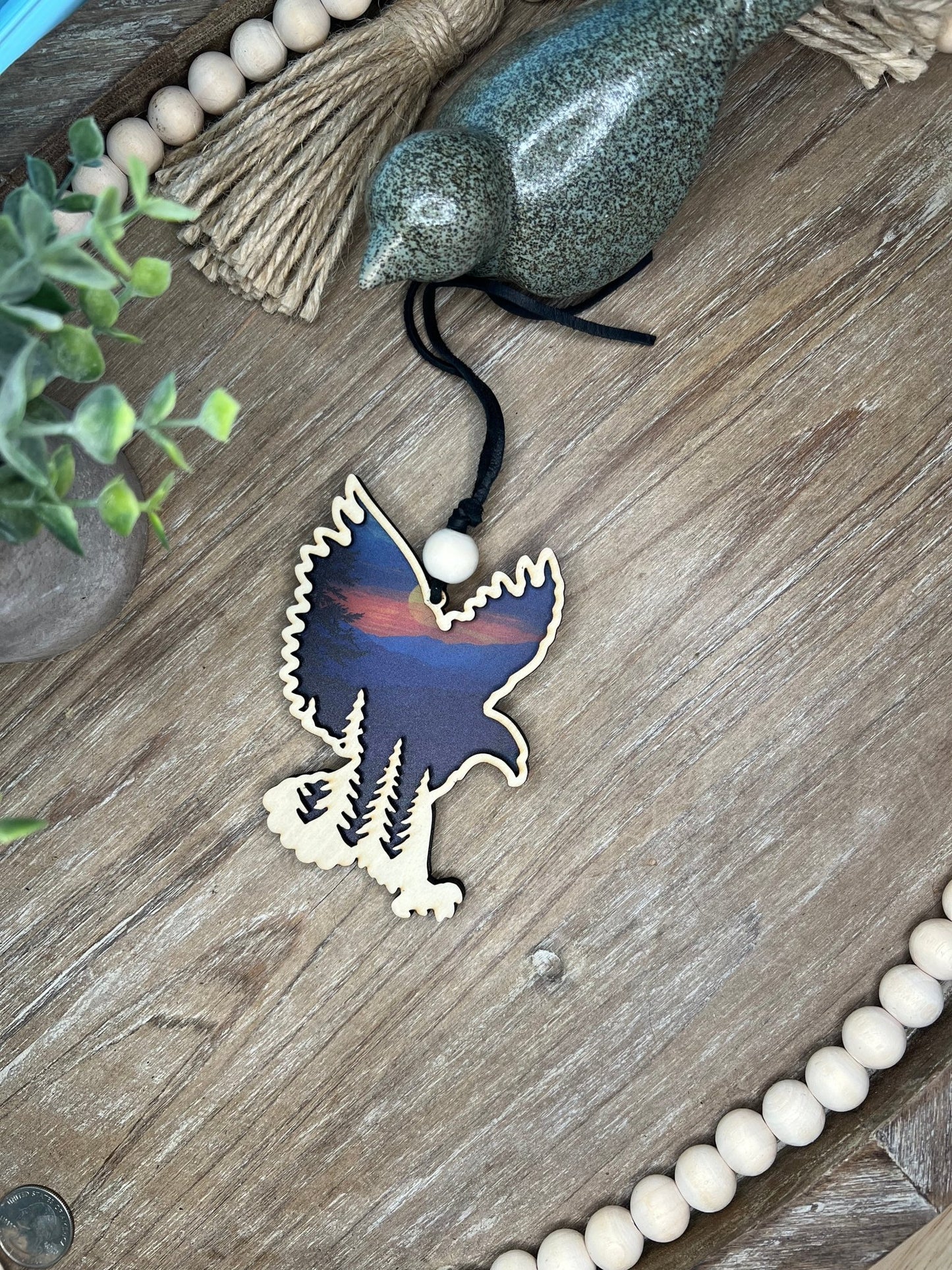 Eagle in Flight suncatcher with wood and multicolor acrylic design.