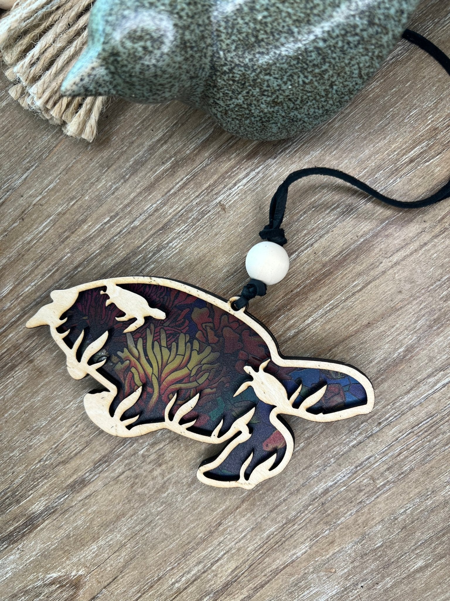 Sea turtle suncatcher with natural wood and multicolor acrylic, perfect for rustic and beach-themed decor.