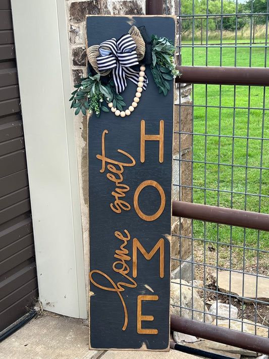 Rustic modern Black Wood Home Sweet Home door lean, 12x48 inches, perfect for cozy decor leaning beside garage door.