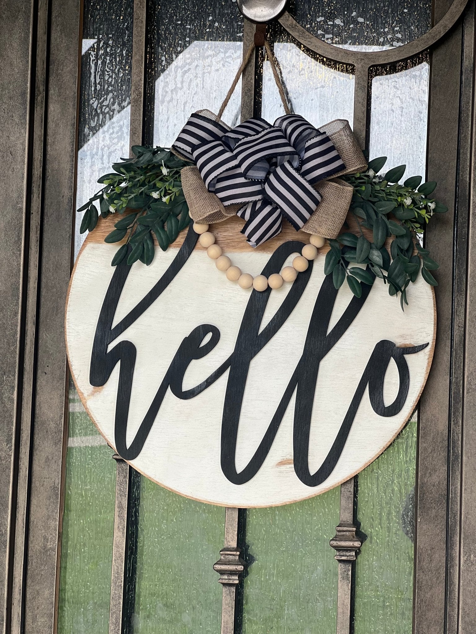 White Hello Door Hanger in rustic wood with black text, 18 inches on metal door.