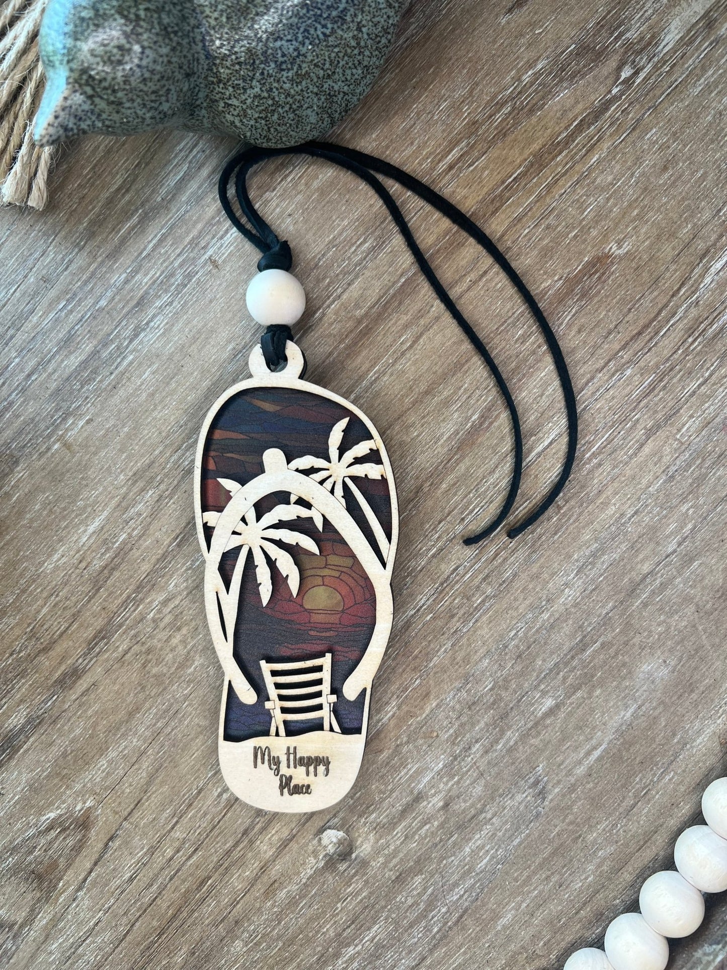 Flip Flop Sunrise Suncatcher featuring rustic wood and multicolor acrylic with a stained glass effect unlit.