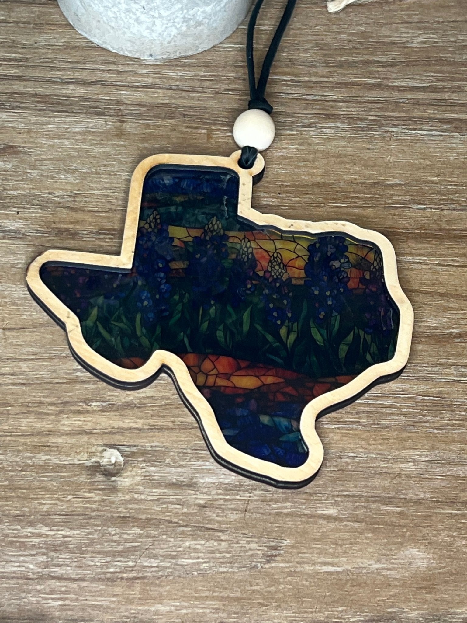 Texas-shaped suncatcher with rustic wood and vibrant multicolor acrylic.