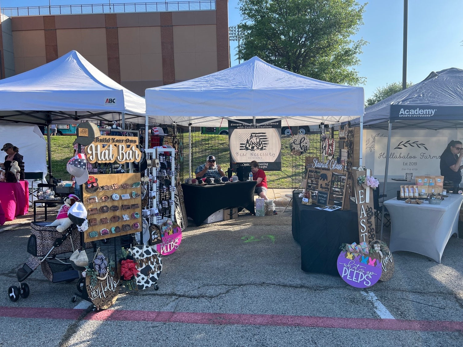Bear Necessity Designs booth at May 2025 Aspasians Market with handmade gifts and decor