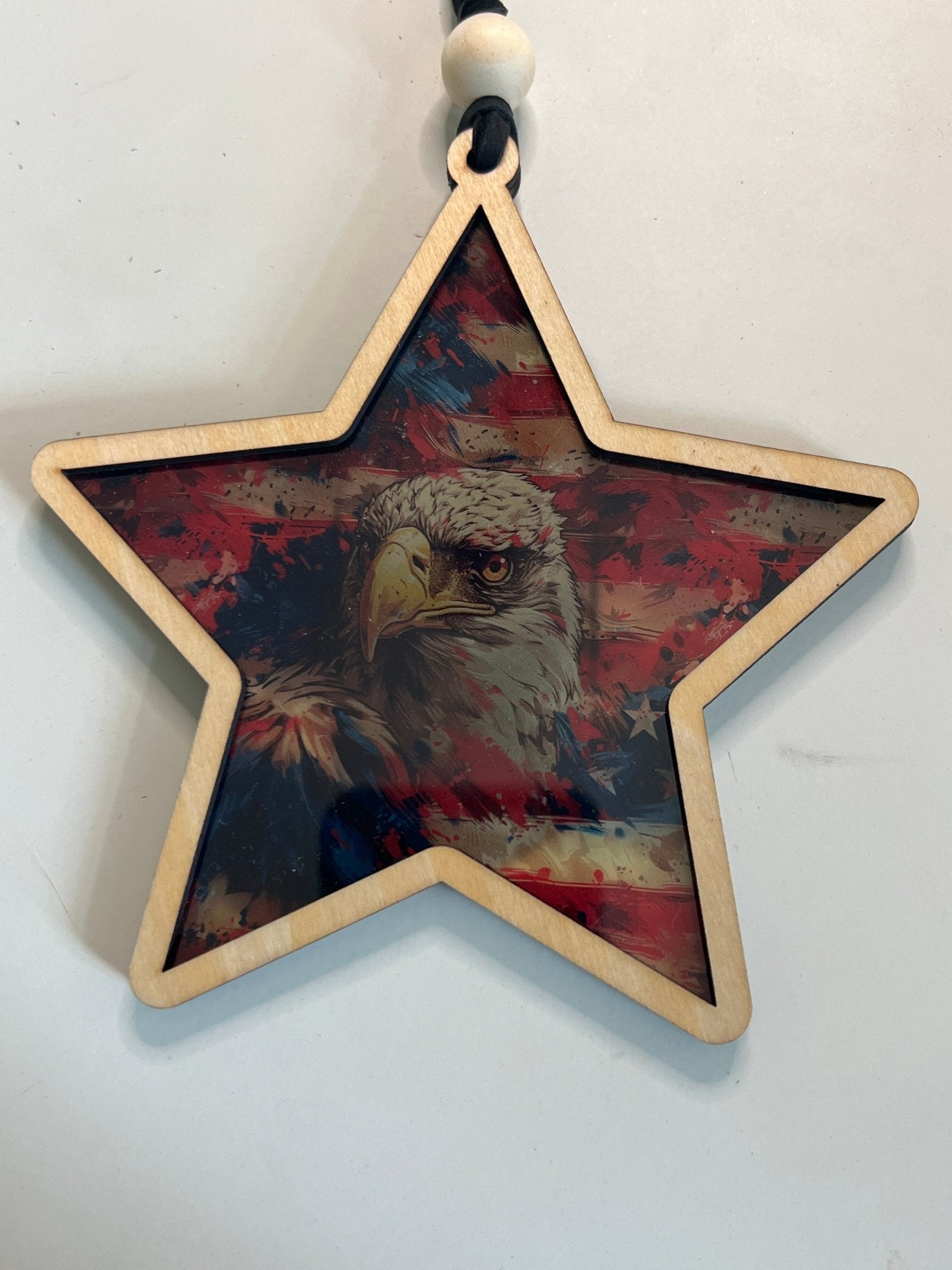 American Eagle star suncatcher with wood and multicolor acrylic, 5.5 inches.