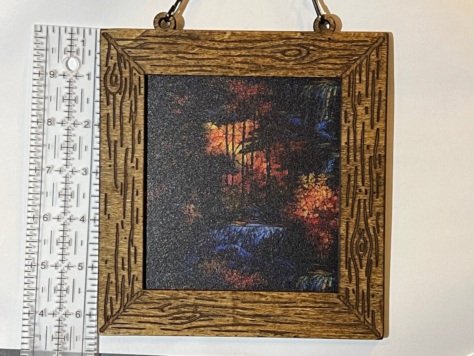 Bear in the Wilderness suncatcher featuring stained glass effect wood and acrylic in a 6-inch multicolor design unlit.