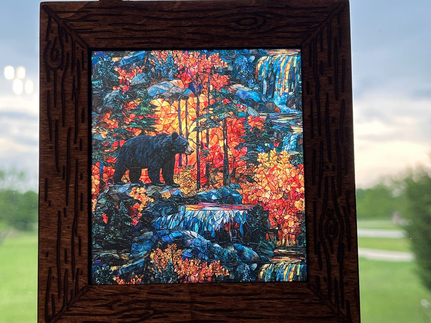 Bear in the Wilderness suncatcher featuring stained glass effect wood and acrylic in a 6-inch multicolor design in sunshine.