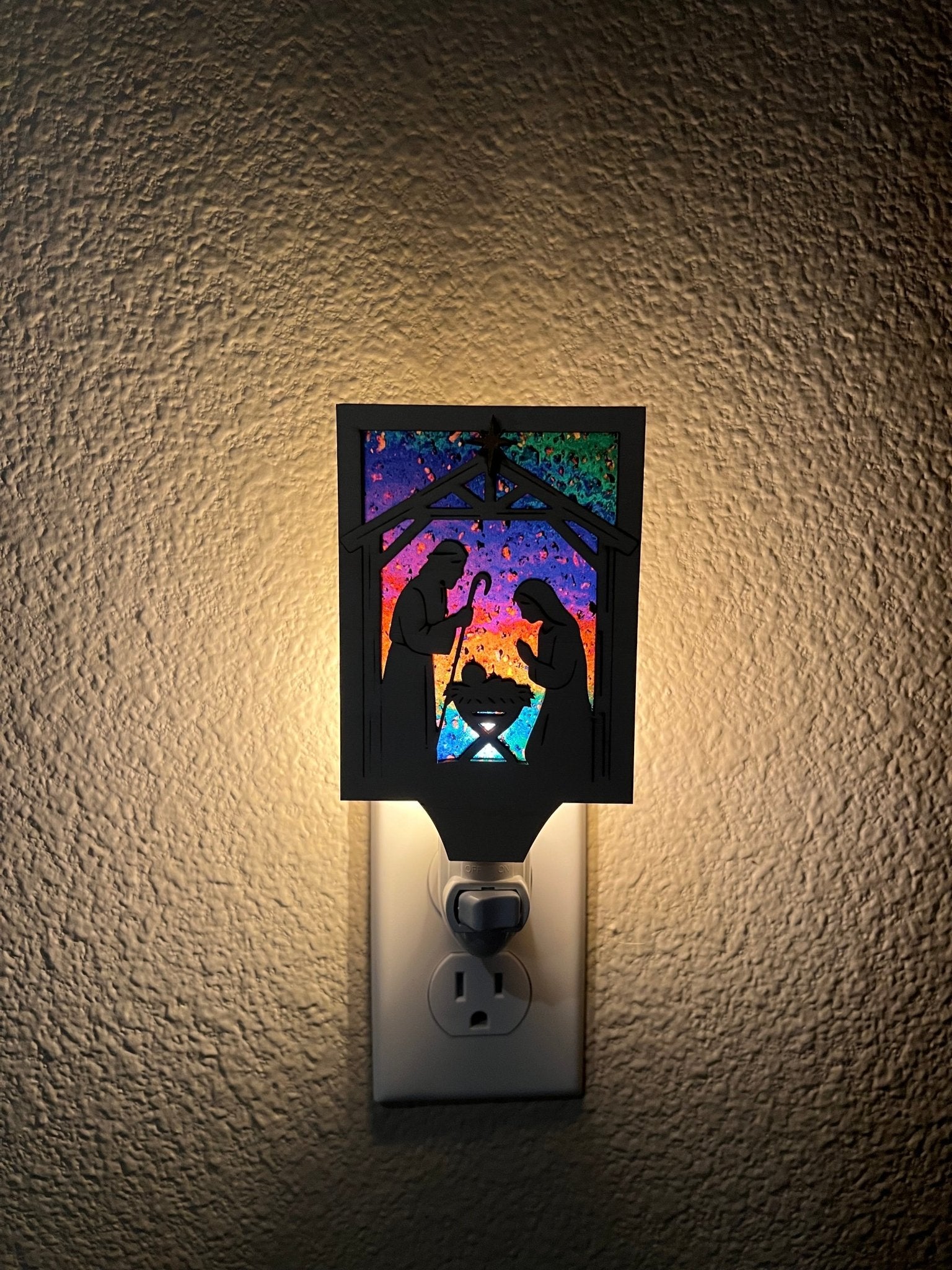 Christmas Nativity Nightlight made of wood and acrylic, featuring natural wood and multicolor elements lighted in hall.