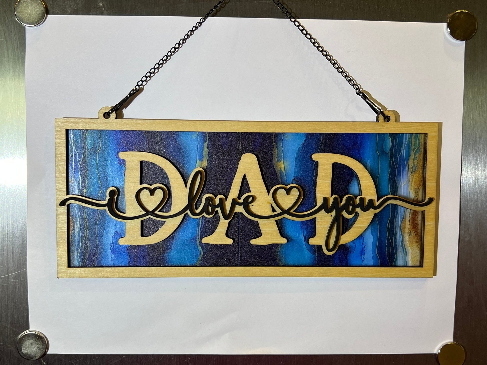 Handmade 'Dad I Love You' wood and acrylic suncatcher with stained glass effect.