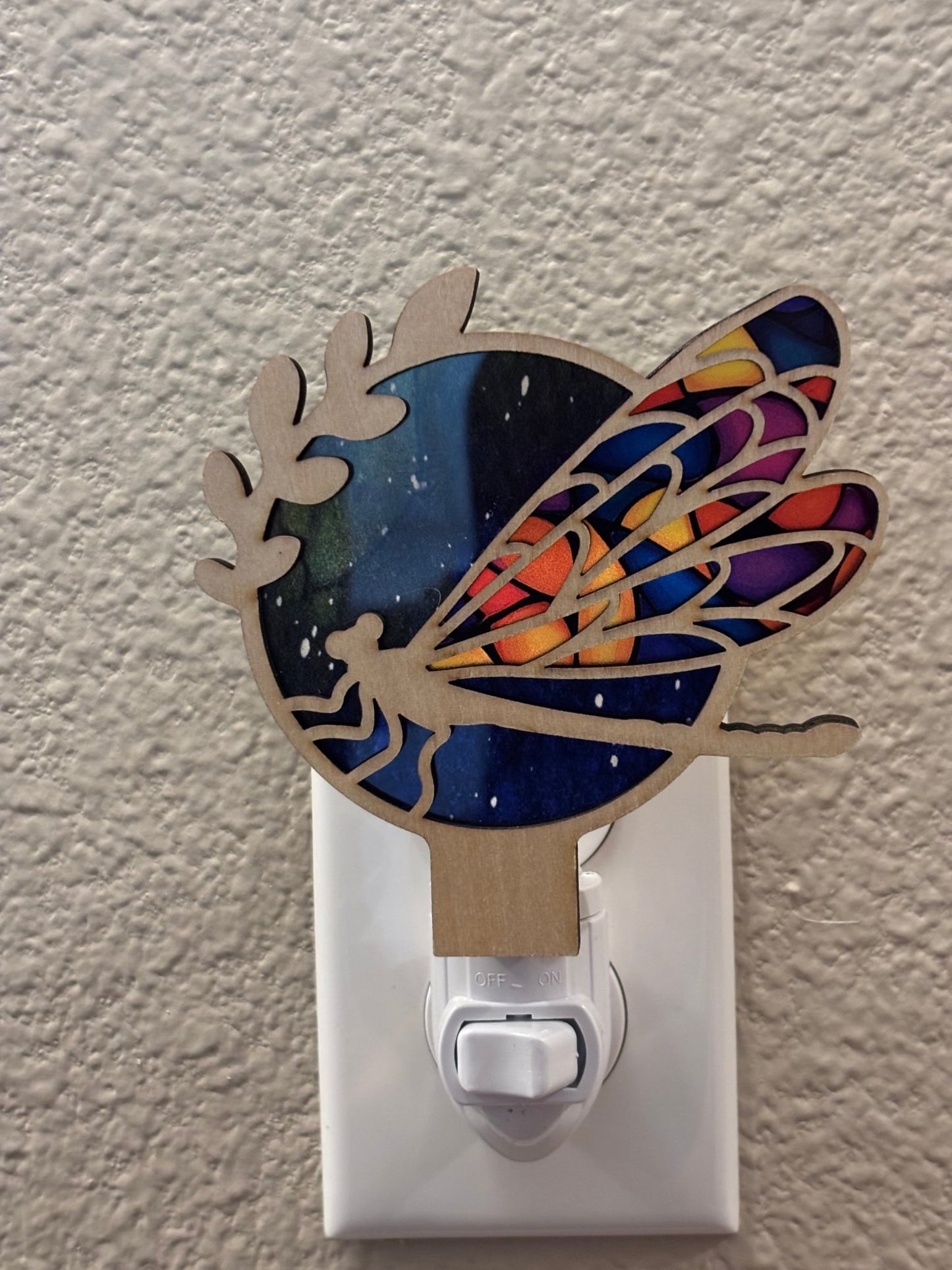 Rustic Dragon Fly nightlight with stained glass effect in wood and acrylic.