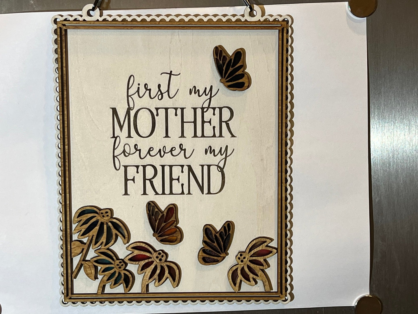 Colorful Mother Butterfly Suncatcher made of acrylic and wood, on a white background.