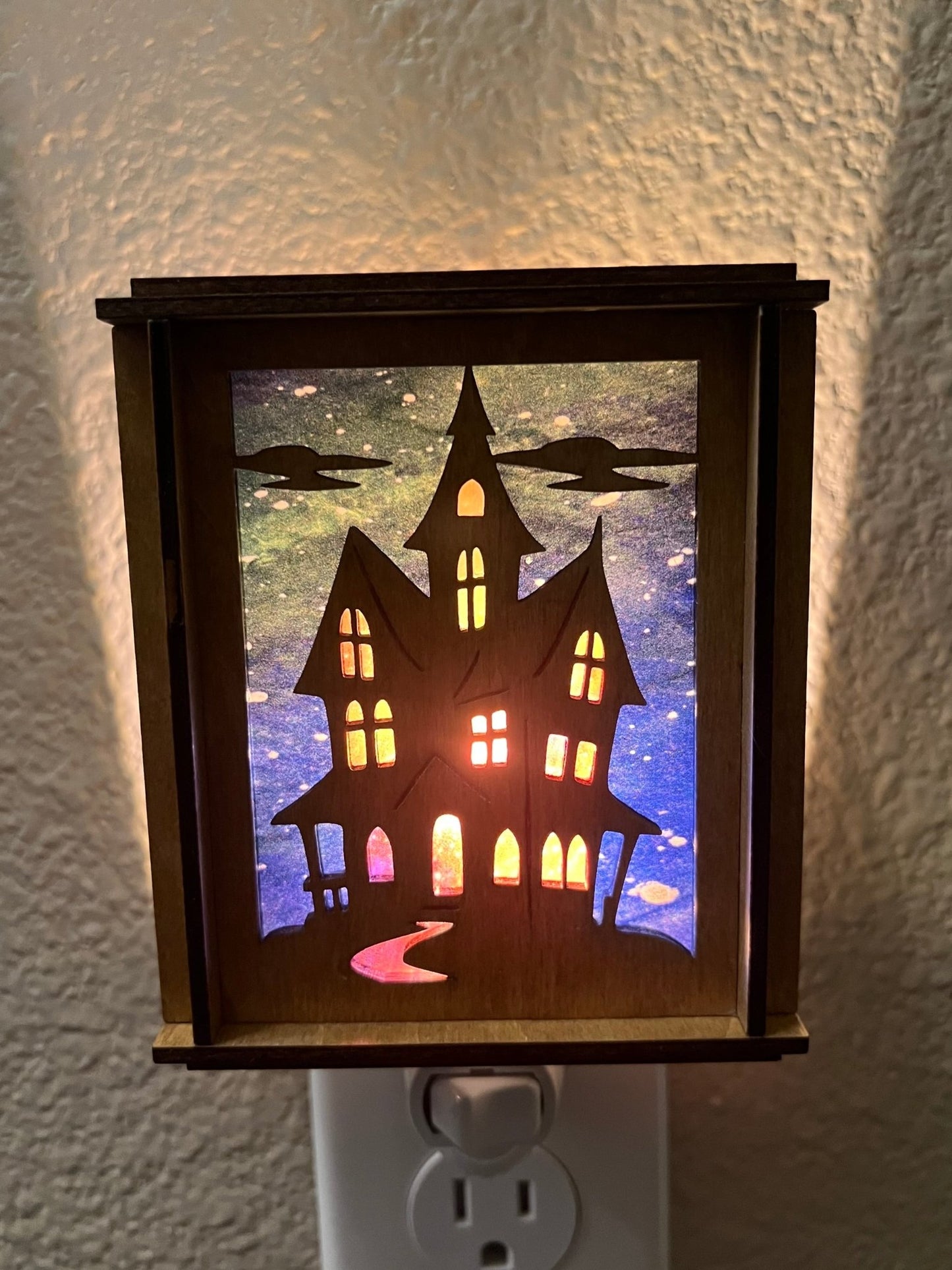 Haunted House Lantern Nightlight with stained glass effect in golden oak wood, perfect for rustic decor - front, light view.