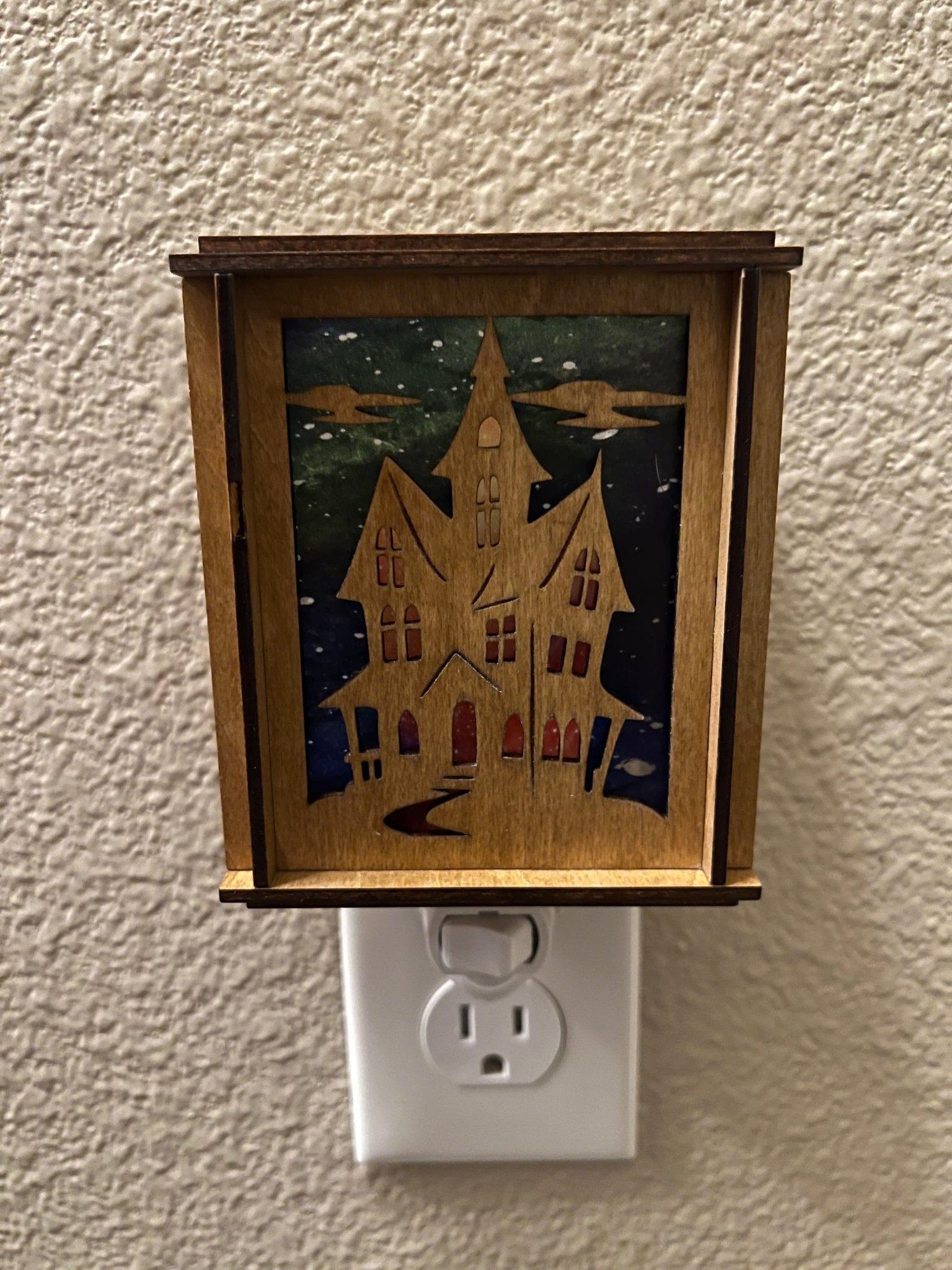 Haunted house nightlight with golden oak stained wood and acrylic stained glass effect, perfect for cozy home decor unlit front view.