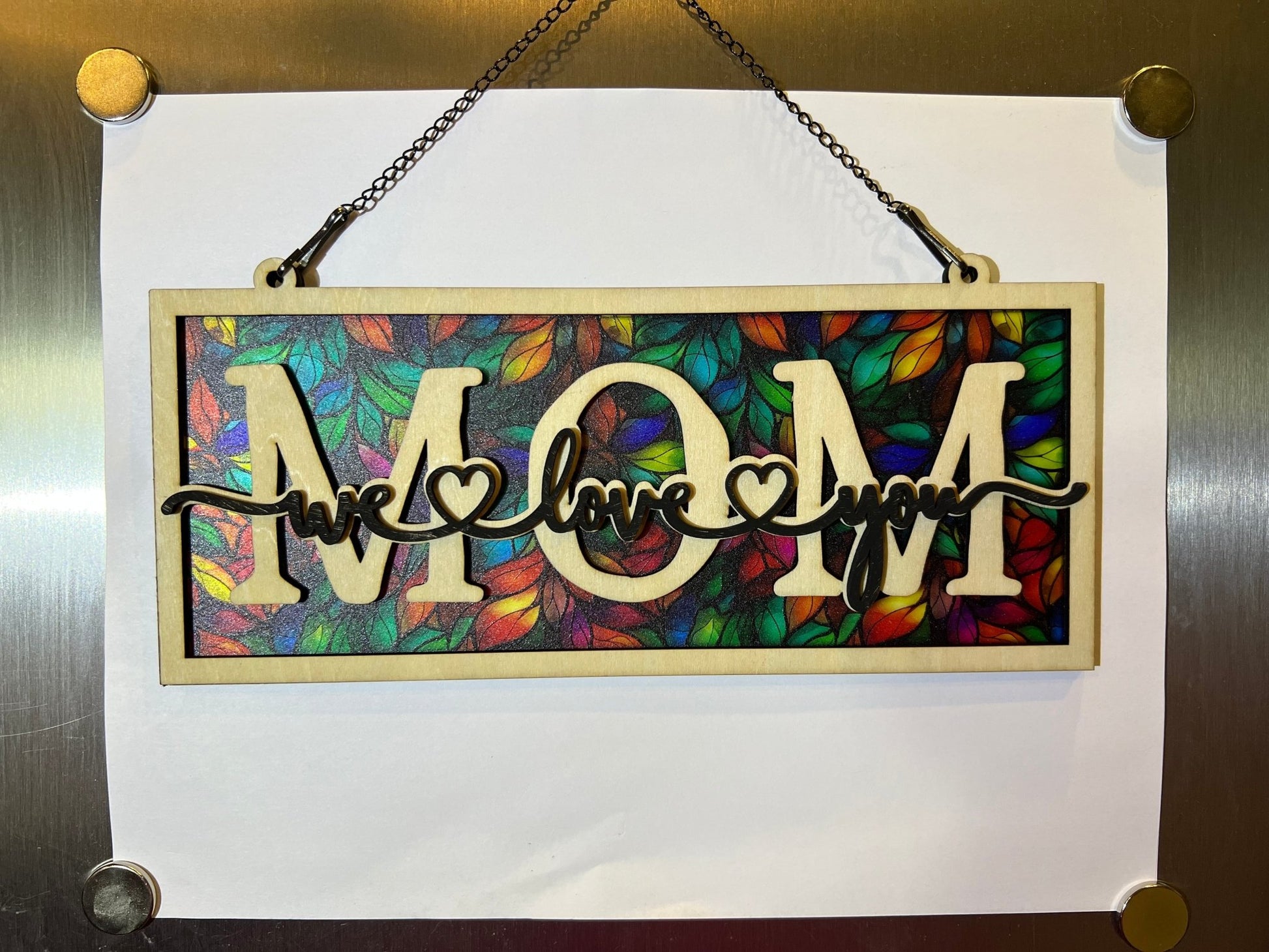 Beautiful mom suncatcher with pink floral design in wood and acrylic, 4.25 x 9.5 inches.