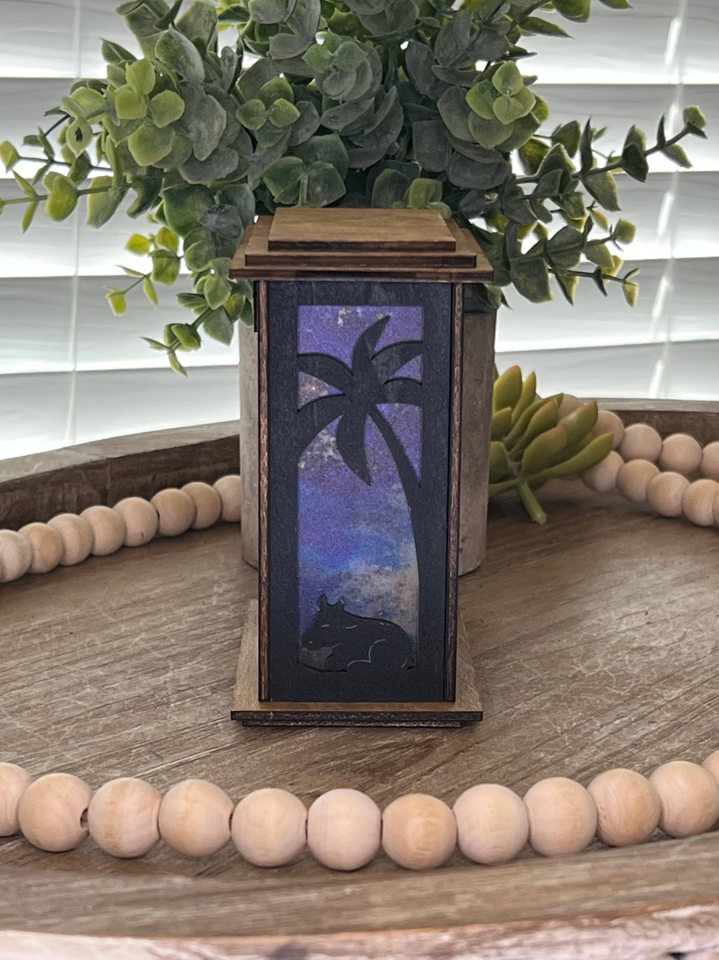 Rustic black and golden oak nativity lantern with LED tea-light candle, perfect for holiday decor, left side, unlit view