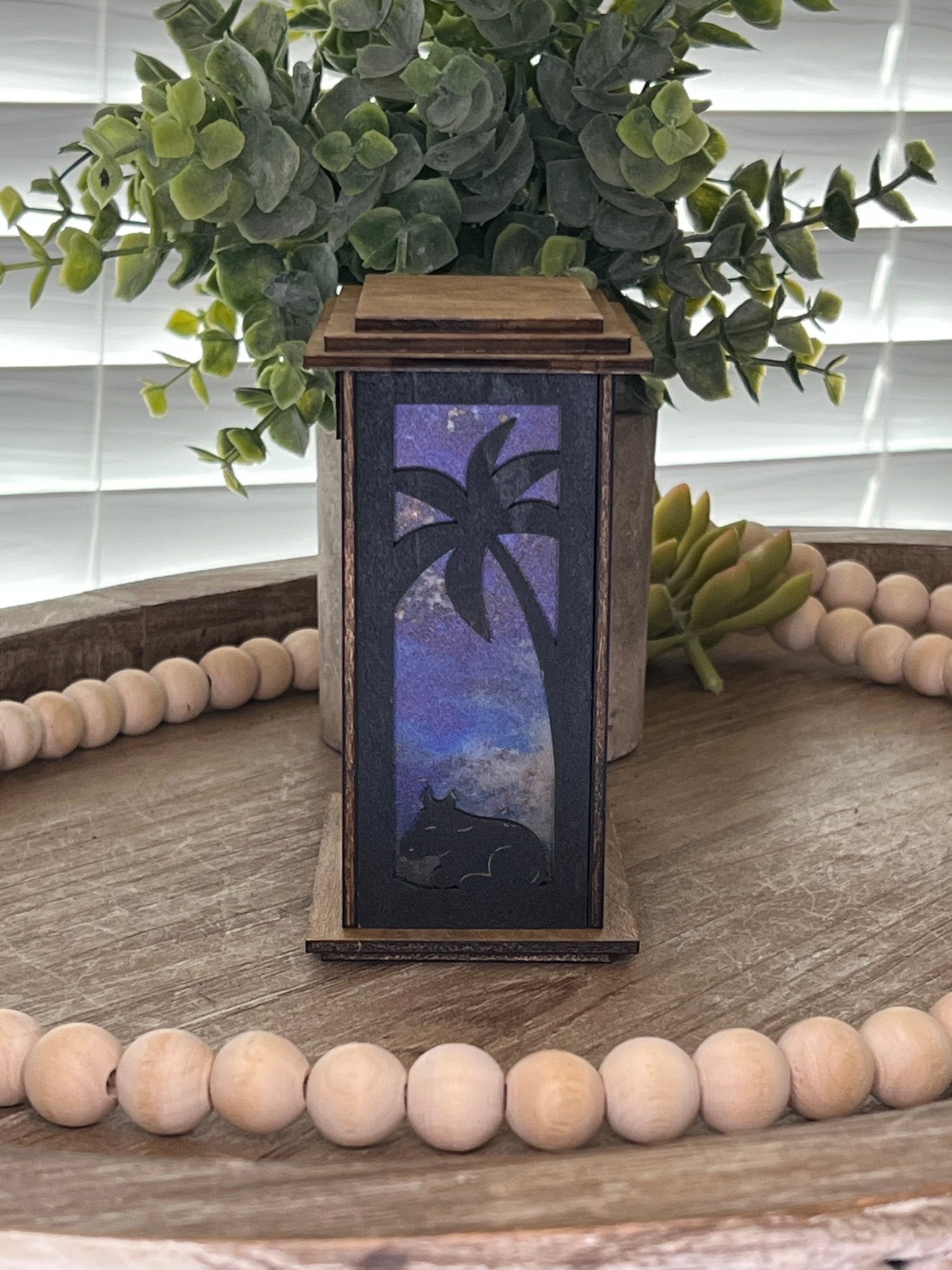 Rustic black and golden oak nativity lantern with LED tea-light candle, perfect for holiday decor, left side, unlit view