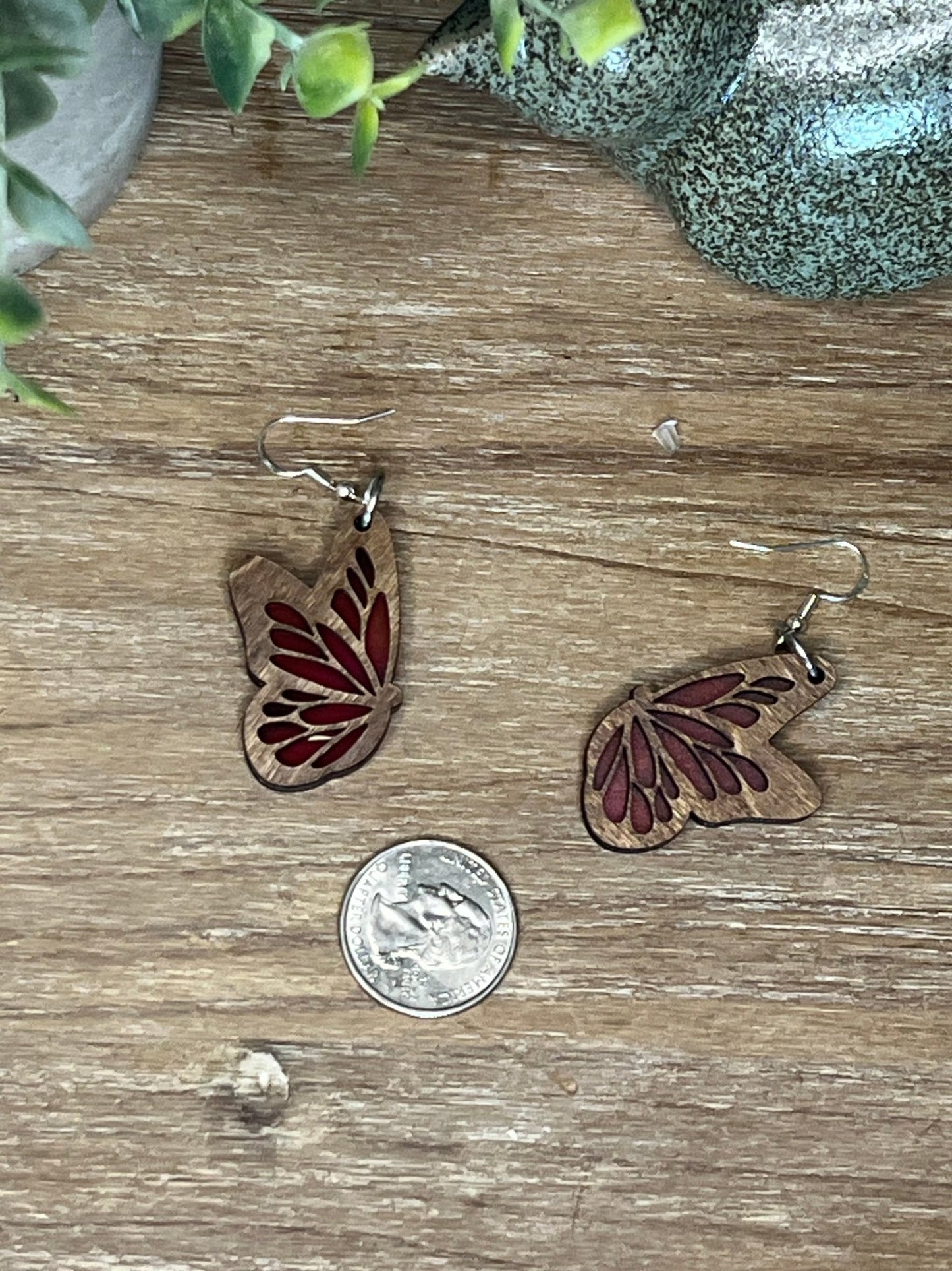 Purple Butterfly earrings made of wood and acrylic with a stained glass effect.