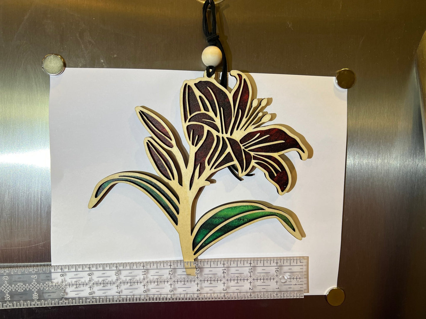 Red Daylily stained glass effect suncatcher with wood and acrylic materials, in 8x8 inches, perfect for rustic home decor.